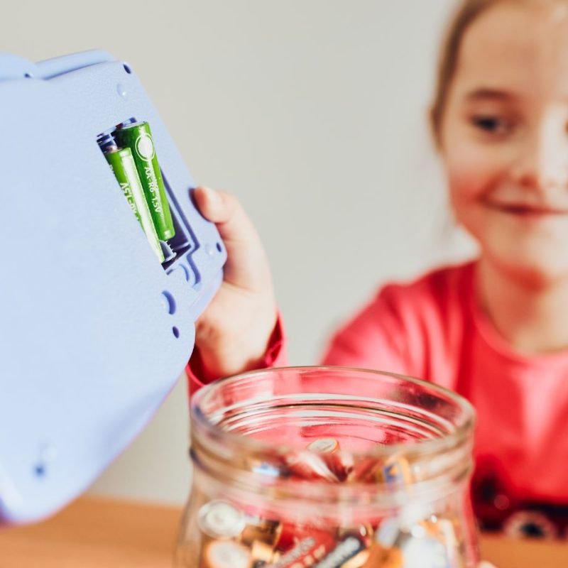 Children using a device with batteries